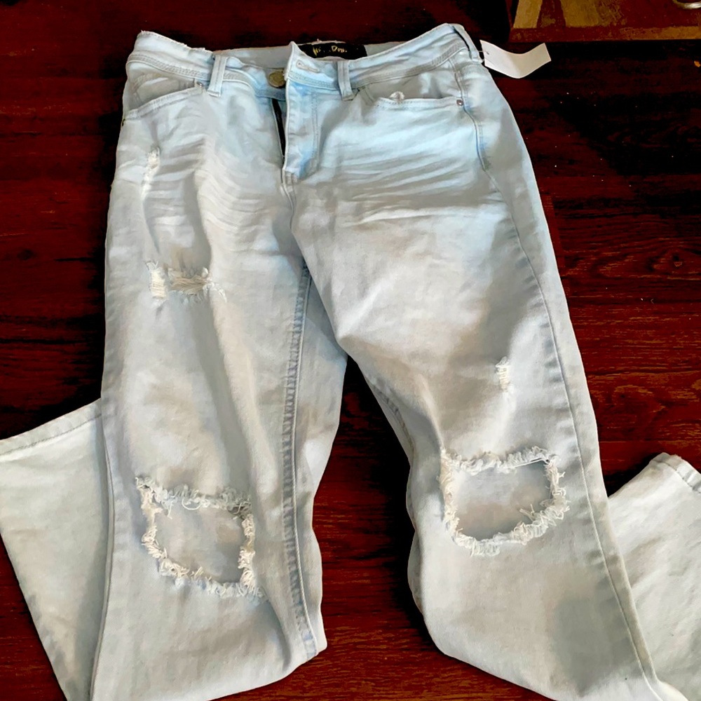 Light blue ripped jeans